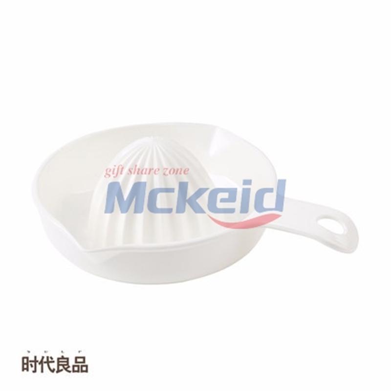 手動榨汁器